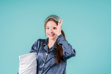 Sleep Pillow Posing Dream Mask Positive Rest Soft Emotion Indoor, A Young Woman in Pajamas Lying Comfortably with a Peaceful Expression in a Cozy Pink Bedroom Setting