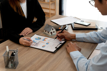 Young business woman is talking about presenting real estate