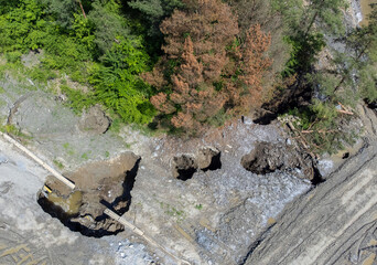 Aerial view of the pits and craters formed by the collapse of the Praid salt mine - Romania