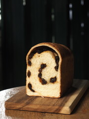 sliced loaf of white sandwich bread with raisin