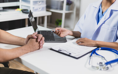 Doctor are giving advice on treatment to patients in hospital examination rooms, treatment diseases from specialists. Medical treatment and health consultation.