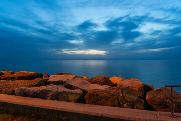 Rocky coast of the Black Sea in Batumi, Georgia, in the evening