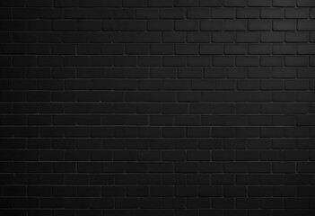 Detailed monochrome black brick wall texture displaying industrial or urban architecture