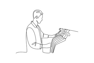 Customer choosing clothes from hangers in clothing store continuous line drawing