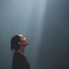 Dramatic woman in the rain urban setting emotional portrait soft lighting inspirational concept