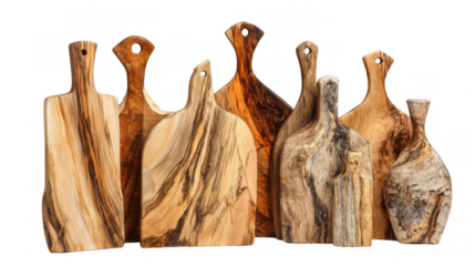 Different rustic wooden cutting boards are standing on a transparent background, showcasing the natural beauty and craftsmanship of these kitchen essentials