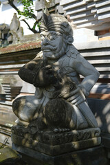 Naklejka premium Traditional Balinese Guardian Statue at House Entrance