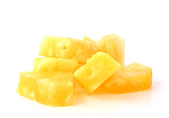 Heap of pineapple chunks. Pineapple slices isolated on white