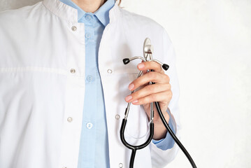 Cropped shot of a female nurse hold her senior patient's hand. Giving Support. Doctor helping old patient with Alzheimer's disease. Female carer holding hands of senior man