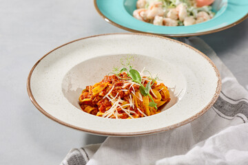 Rustic Tagliatelle Bolognese in Natural Lighting with Earthy Contrast and Textured Composition