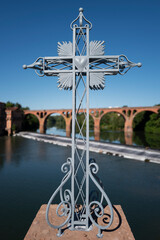 cross on a bridge in Albi, France