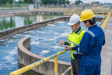 Environmental engineers work at wastewater treatment plants,Water supply engineering working at...