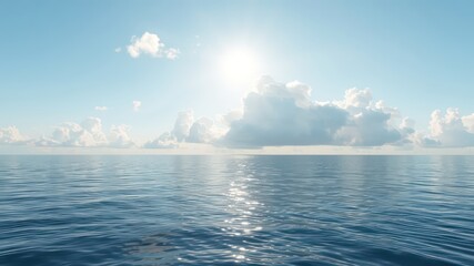 Calm, blue ocean water reflects the sunlight under a soft blue sky filled with gentle, puffy white clouds along the distant horizon