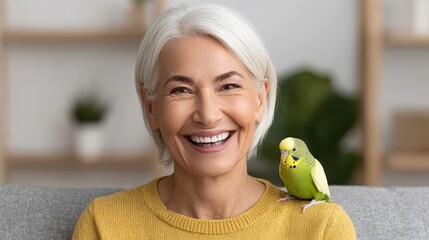 Happy elderly woman laughing with pet bird at home embracing joyful moments in a cozy environment