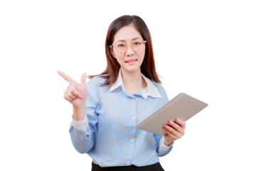 Asian young beautiful woman wearing glasses holds a tablet and points forward with her right hand.