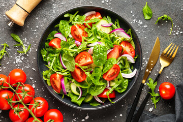 Fresh salad with leaves and vegetables.