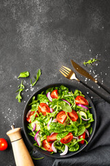 Fresh salad with leaves and vegetables.