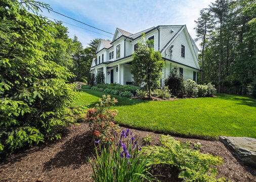 Side front garden of suburban home in Spring