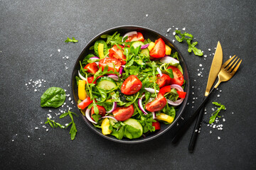 Fresh salad with leaves and vegetables.