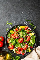 Fresh salad with leaves and vegetables.