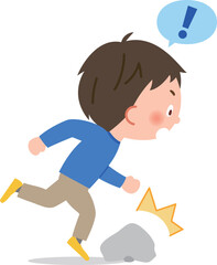 石に躓く男子小学生
