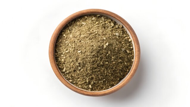 Bowl filled with traditional zaatar spice powder isolated white backgroundBowl filled with traditional zaatar spice powder isolated white background