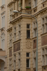 The facade of a wellpreserved historic building showcases intricate architectural elements,...