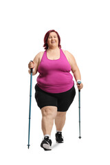 Overweight woman walking with hiking poles