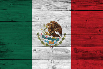 Wooden background with the country flag of Mexico. National Day of Mexico  September 16th.