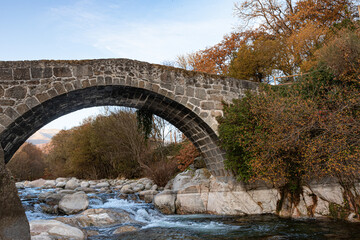 The Parral Bridge over calm waters in Jarandilla de la Vera, Cáceres, Spain