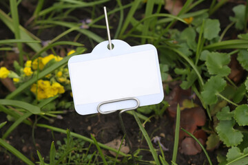 Sign on a grass with empty space for text.