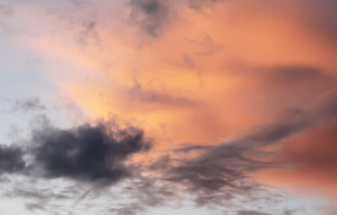 A sunset sky with soft clouds.