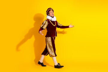 Elegant nobleman in period attire against vibrant yellow background, showcasing history and modern...