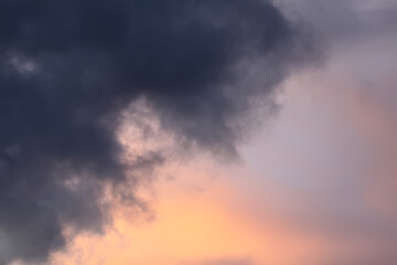 A sunset sky with soft clouds.
