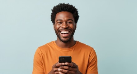 Happy man using smartphone for communication and entertainment on a blue background