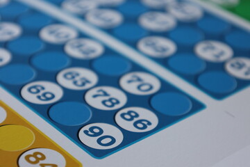 printing of colored and numbered game cards called bingo in the printing house. selective focus