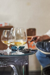 Man pairing rum and cigar in relaxing atmosphere