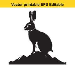 Silhouette of a Hare Sitting on a Hilltop