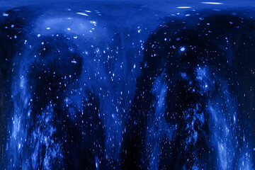 Abstract blue galaxy background with star-like patterns and swirling cosmic elements