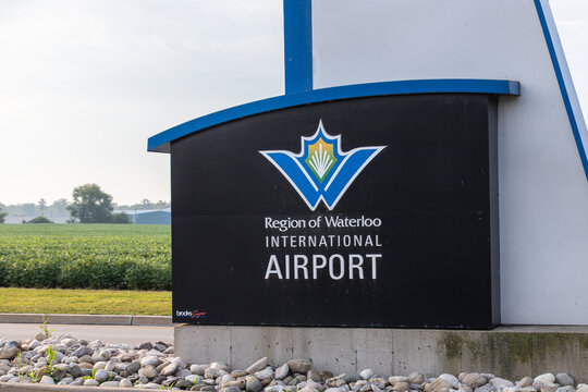 Waterloo, CANADA - Aug 5 2024 : Detailed view of the Region of Waterloo International Airport entrance sign featuring the official logo and modern design elements.