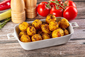 Baked small baby potato with herbs