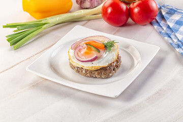 Beefsteak chop with roasted egg