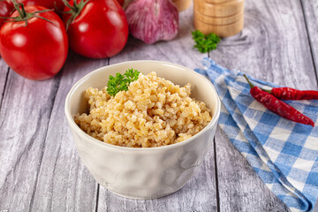 Vegan cuisine - boiled bulgur garnish