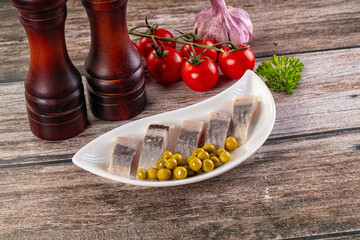 Slided marinated salted herring fillet