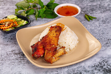 Spicy roasted chicken wing with rice