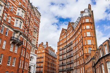 Iconic Red Brick Buildings in London with Classic Architecture