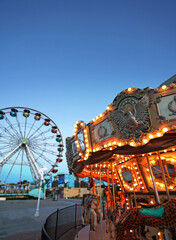 The carousel and ferris wheel at the boardwalk in Carolina Beach, North Carolina