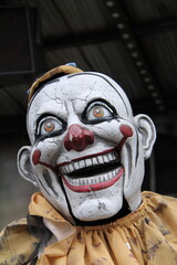 The Well Used Face of a Clown Mannequin Figure.