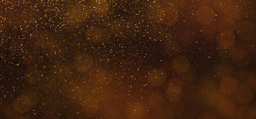 Dark brown panorama background with golden sparkling lights, holiday wallpaper, copy space © Prostock-studio