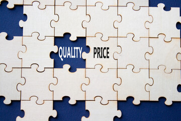 Fototapeta premium Price or Quality symbol. Concept word Price or Quality on wooden puzzle. Beautiful deep blue background. Business and Price or Quality concept. Copy space